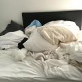 How can I make my bed look good but messy?